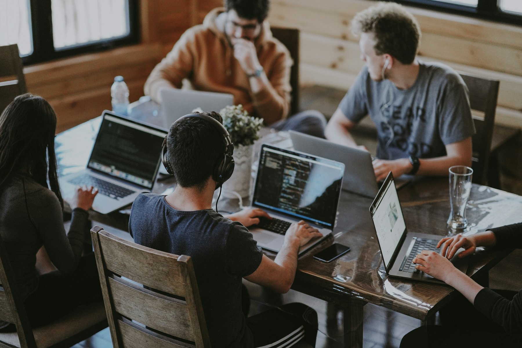 A small team working together around a table